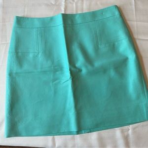 J.Crew Mini Skirt Sz 12  Turquoise Pencil Straight Condition is Pre-owned.